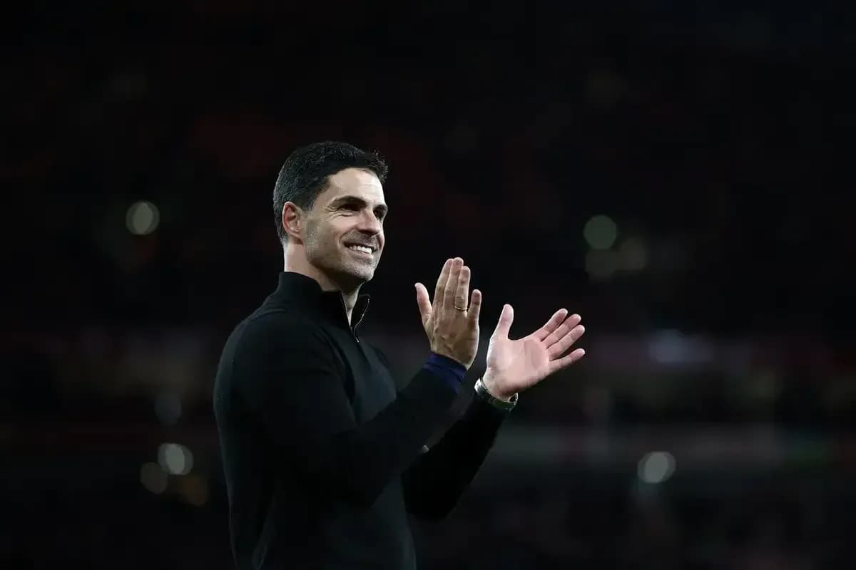 Coach applauding supporters after the match