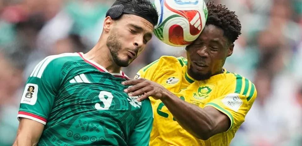 Player heads the ball during Mexico vs South Africa match