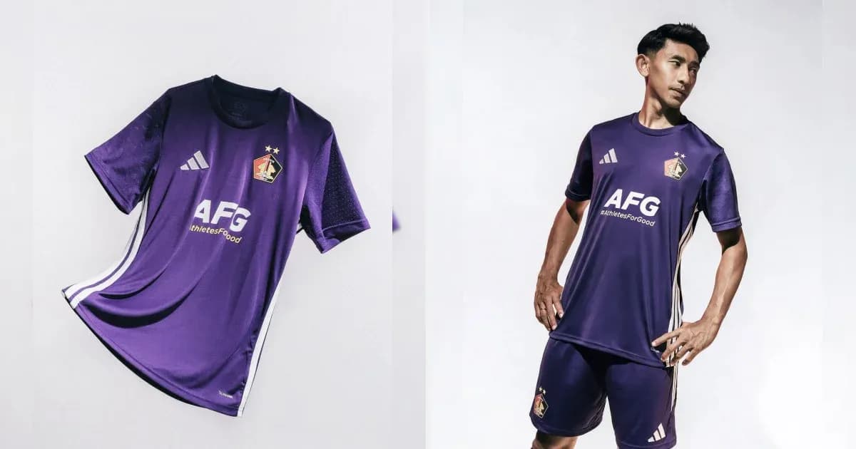 Purple football kit displayed with model wearing it