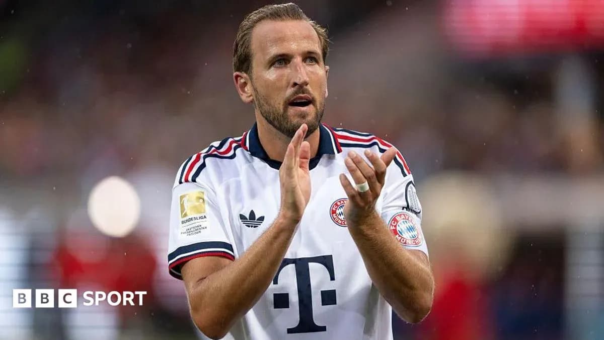 Player applauding fans wearing Bayern Munich kit