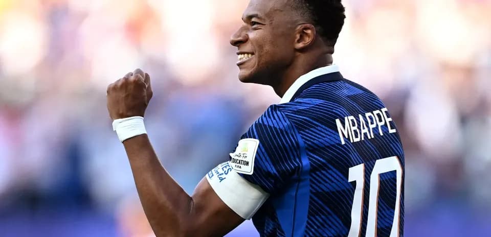 Kylian Mbappe celebrating during a football match