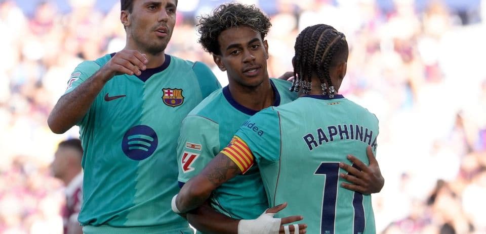 Barcelona players celebrating a goal during match