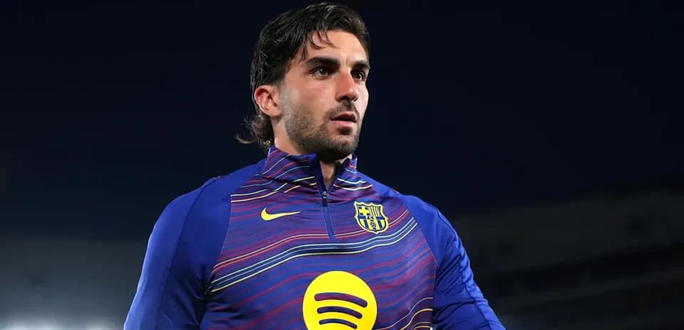 Football player in Barcelona training gear during warm-up