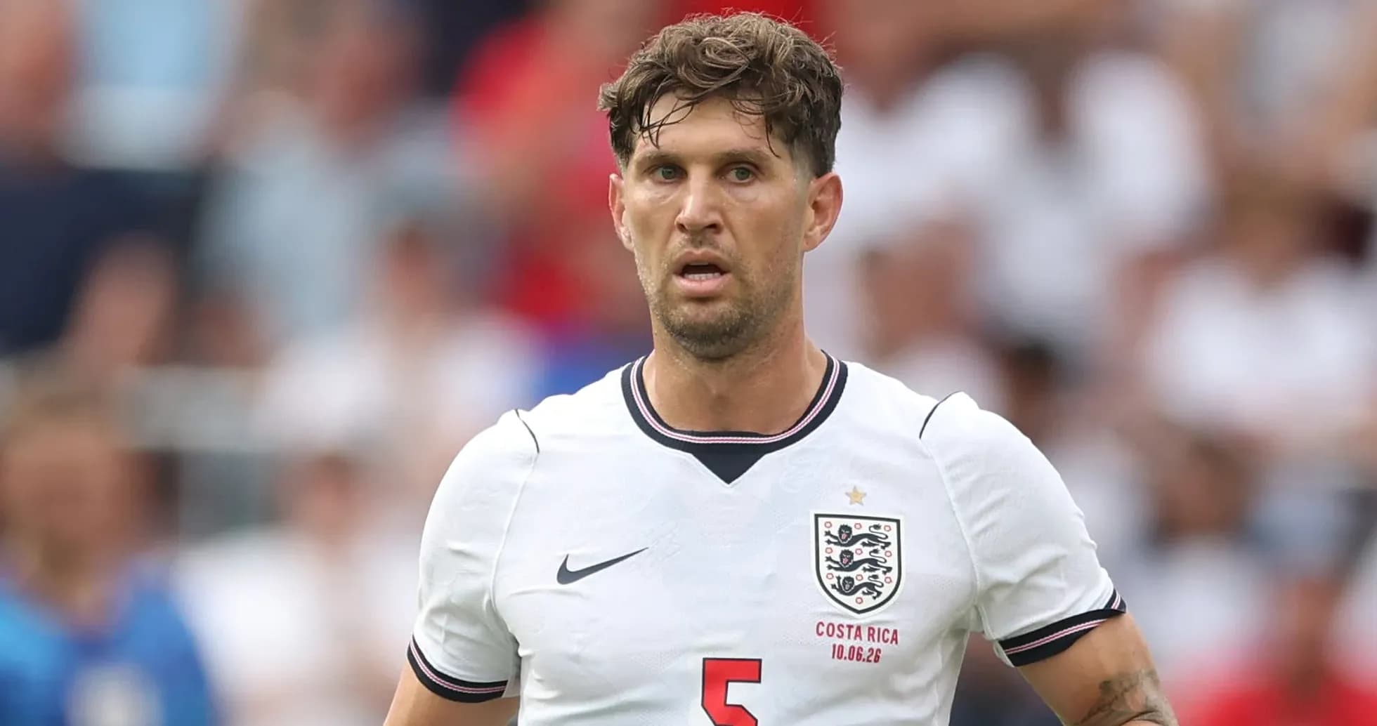Player in England kit during a football match