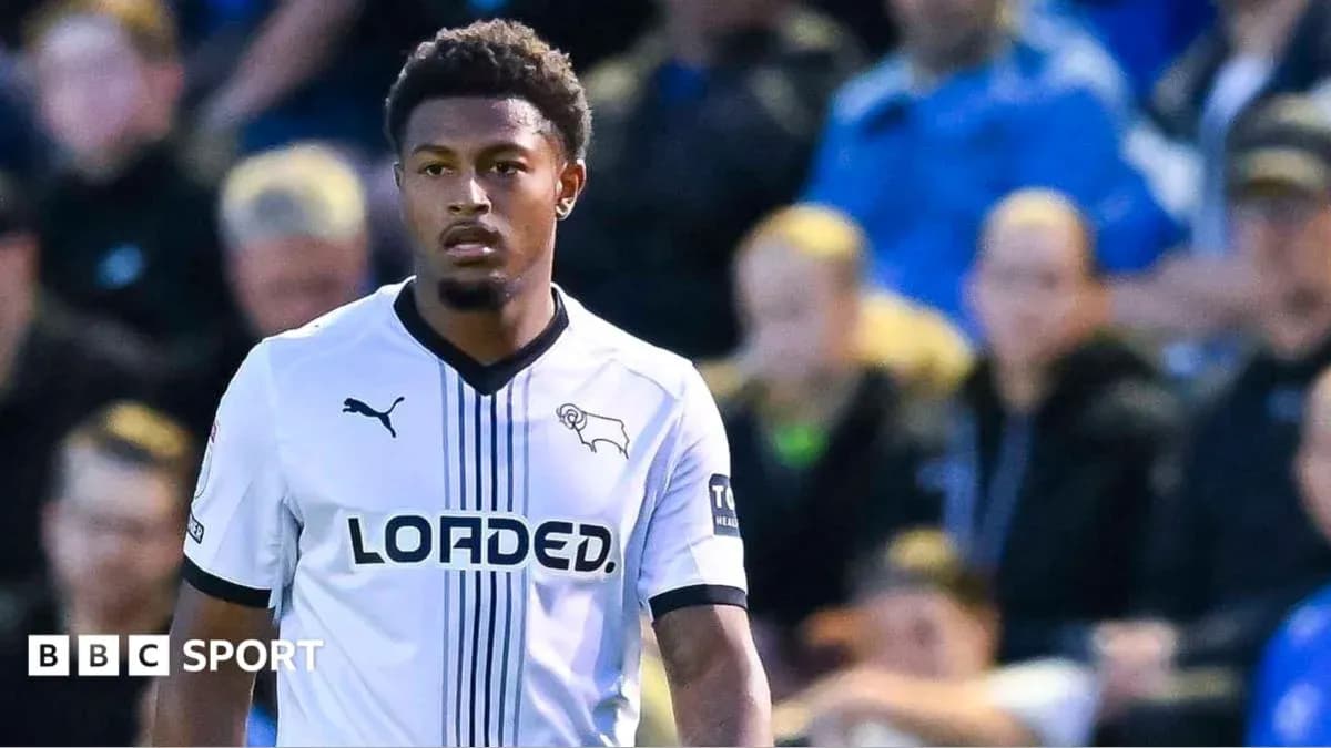 Player in Derby County kit on the pitch