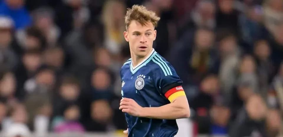 Player in Germany kit during football match