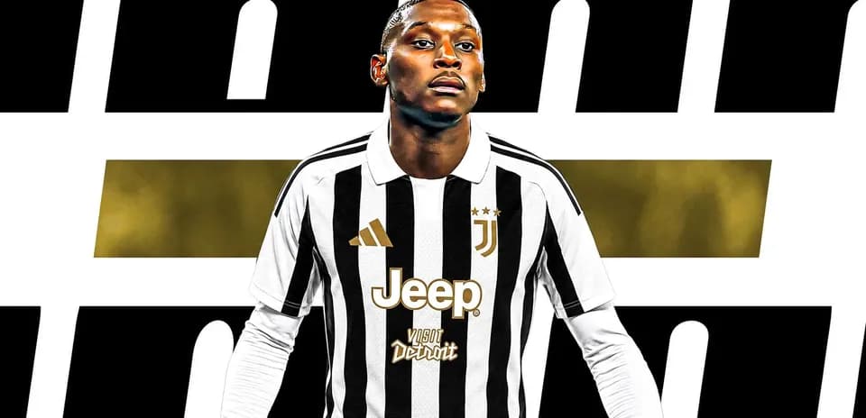 Player wearing Juventus jersey with sponsor logos