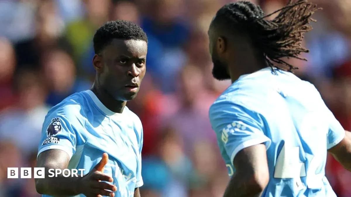 Two players discussing during a football match