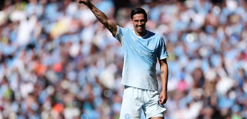 Player celebrating with thumbs up during match