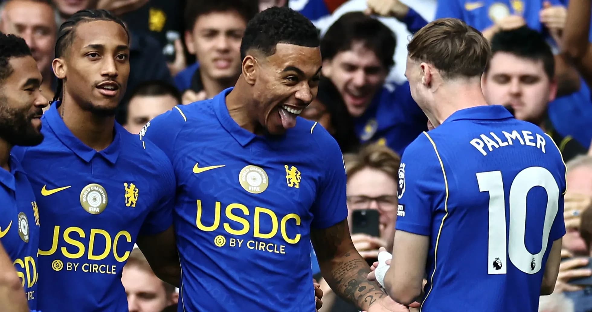 Chelsea players celebrating a goal during a match