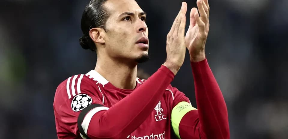 Player applauding fans during a match