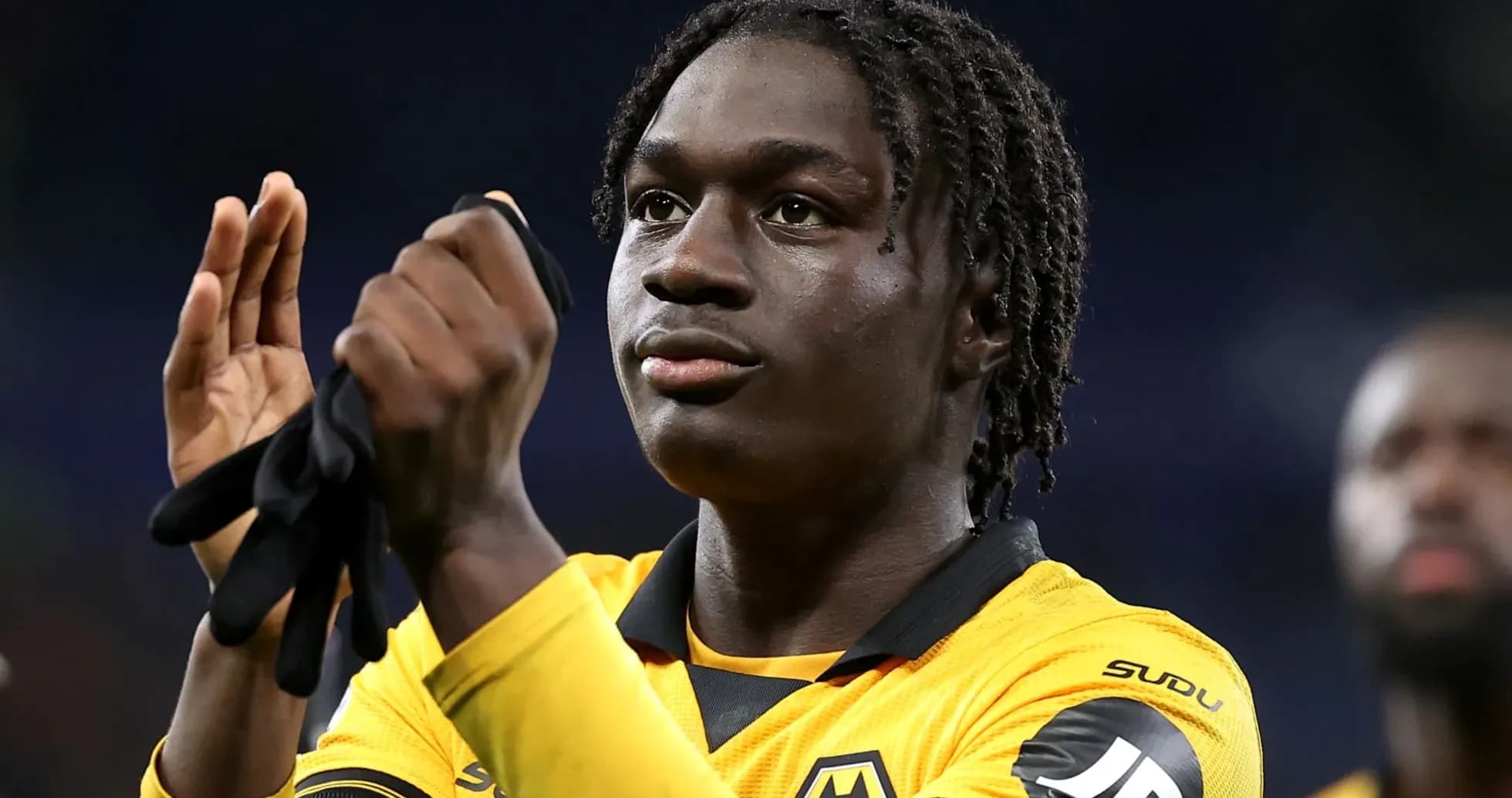Player applauding wearing Wolverhampton Wanderers jersey