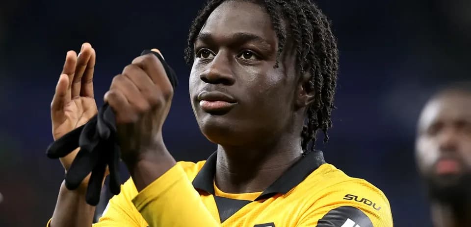 Player applauding wearing Wolverhampton Wanderers jersey