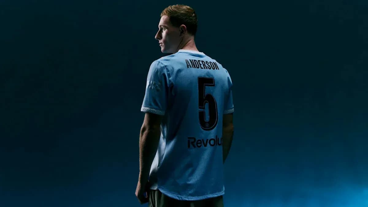 Player wearing blue jersey with number 5