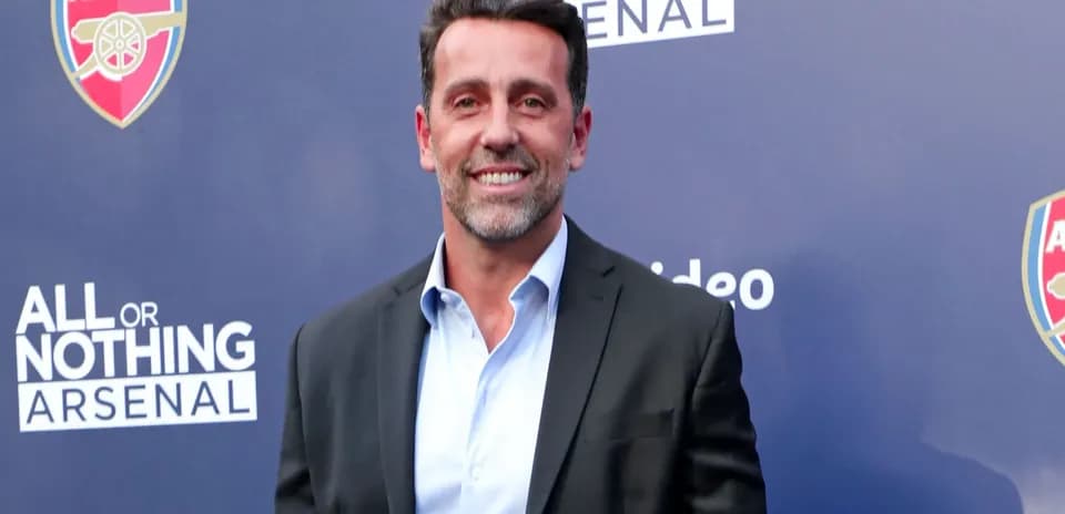 Man smiling at event promoting Arsenal documentary