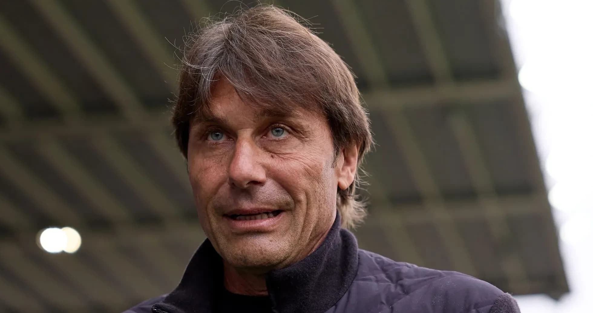 Football manager speaking during press conference