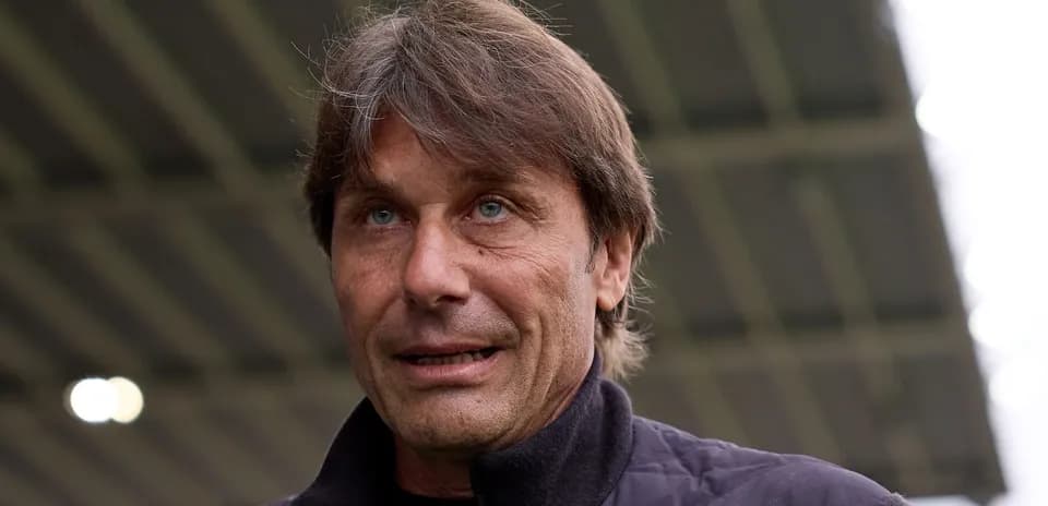 Football manager speaking during press conference