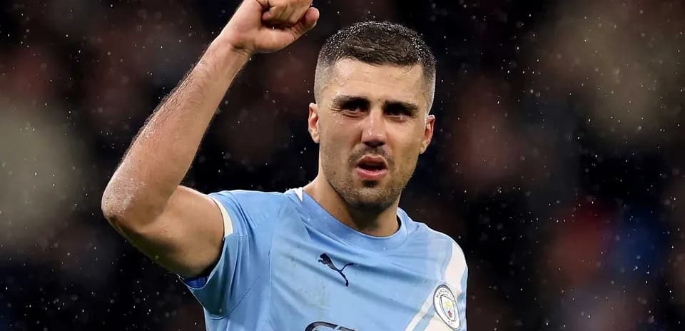 Player celebrating after scoring a goal for Manchester City