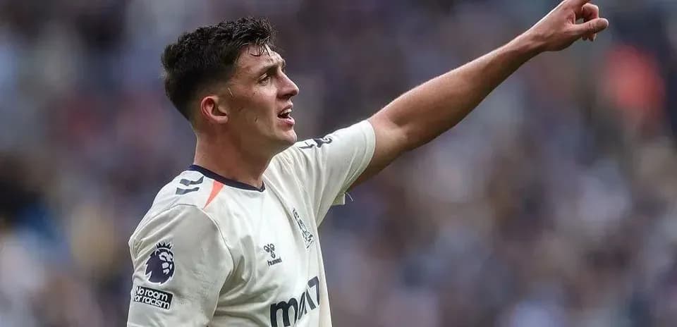 Player celebrating and pointing during a match