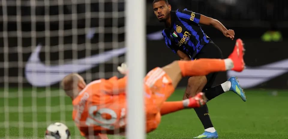Player taking a shot on goal during match