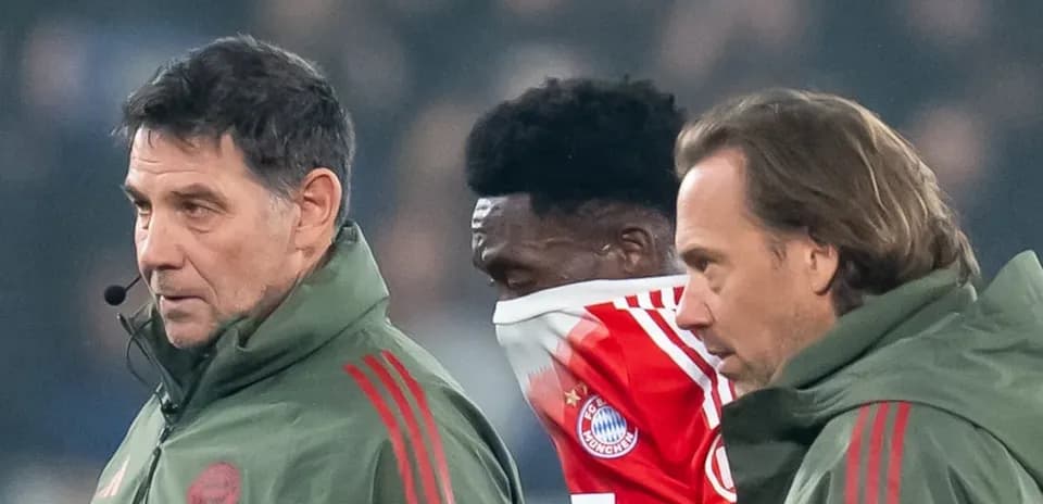 Bayern Munich staff attending to injured player