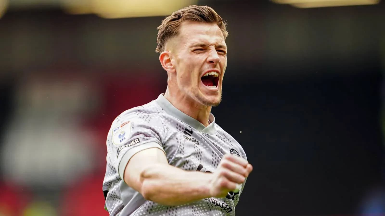 Player celebrating passionately during a match