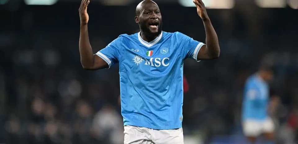 Player celebrating in Napoli jersey during match