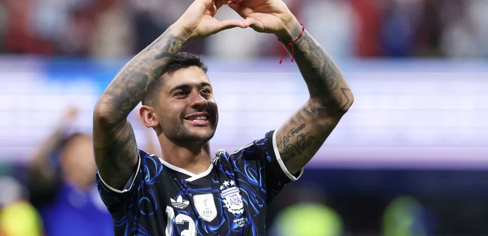 Player celebrating and making heart gesture after match