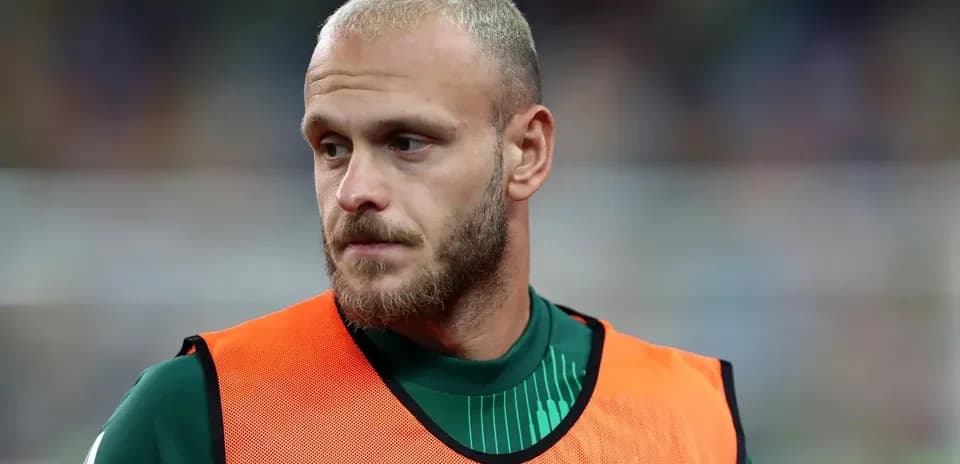 Goalkeeper in warm-up jersey before match