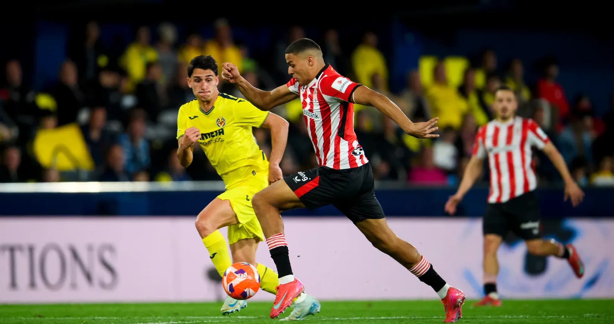 Athletic Club player chasing Villarreal opponent