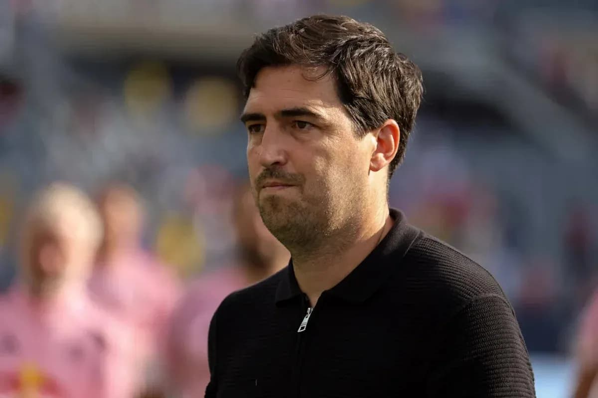 Coach observing players during a match
