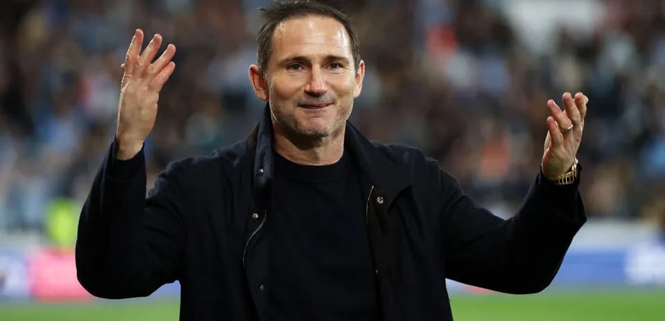 Coach gesturing during a match celebration