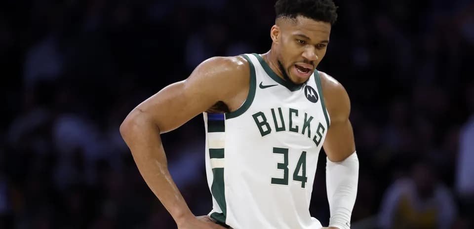 Player in Bucks jersey during a game moment
