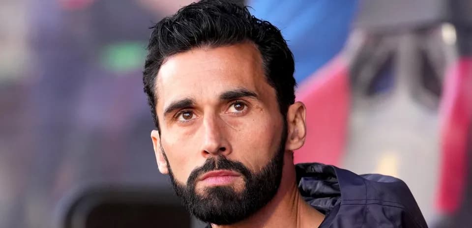 Close-up of a man with a beard looking thoughtfully