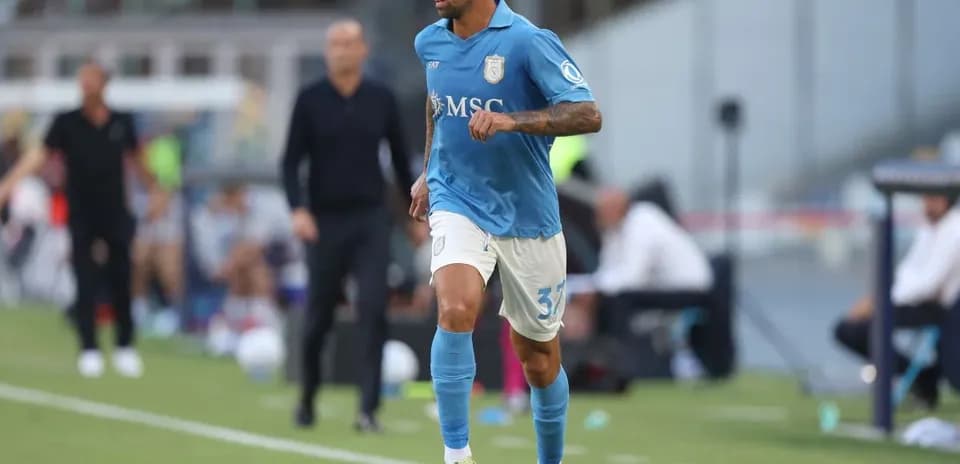 Player running with ball during football match