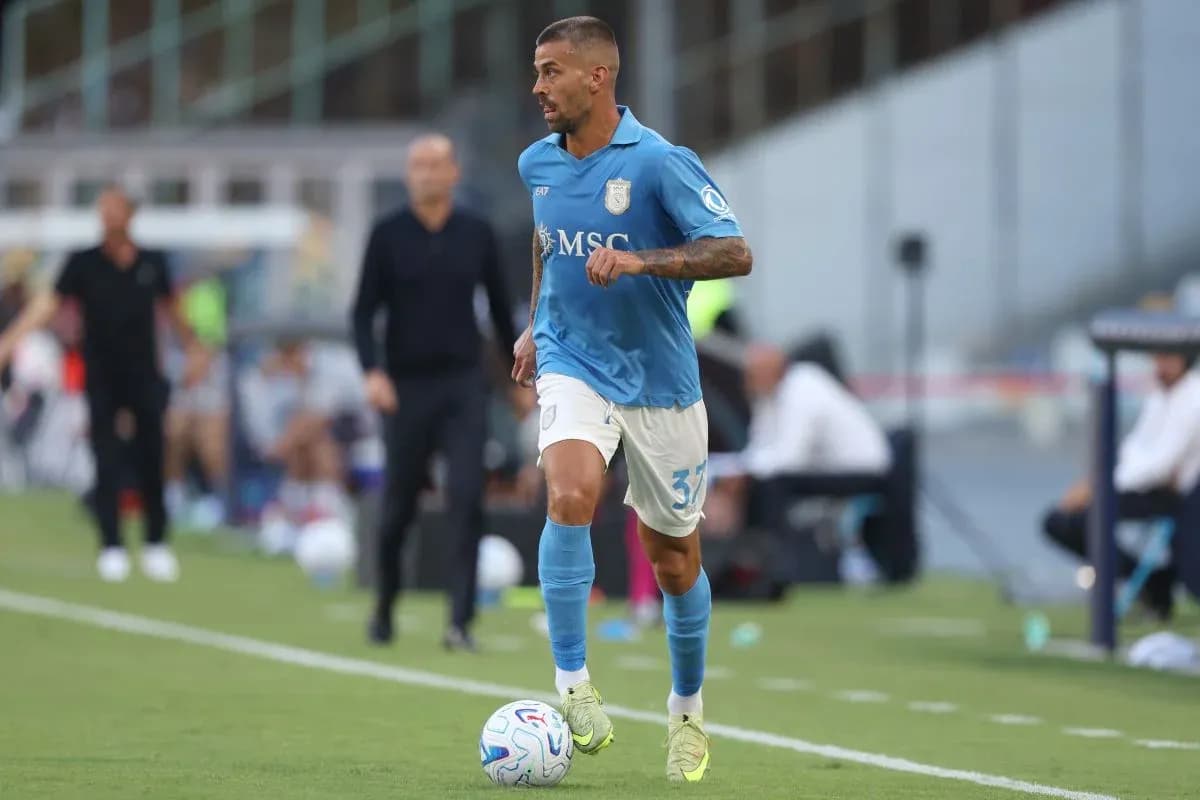 Player running with ball during football match