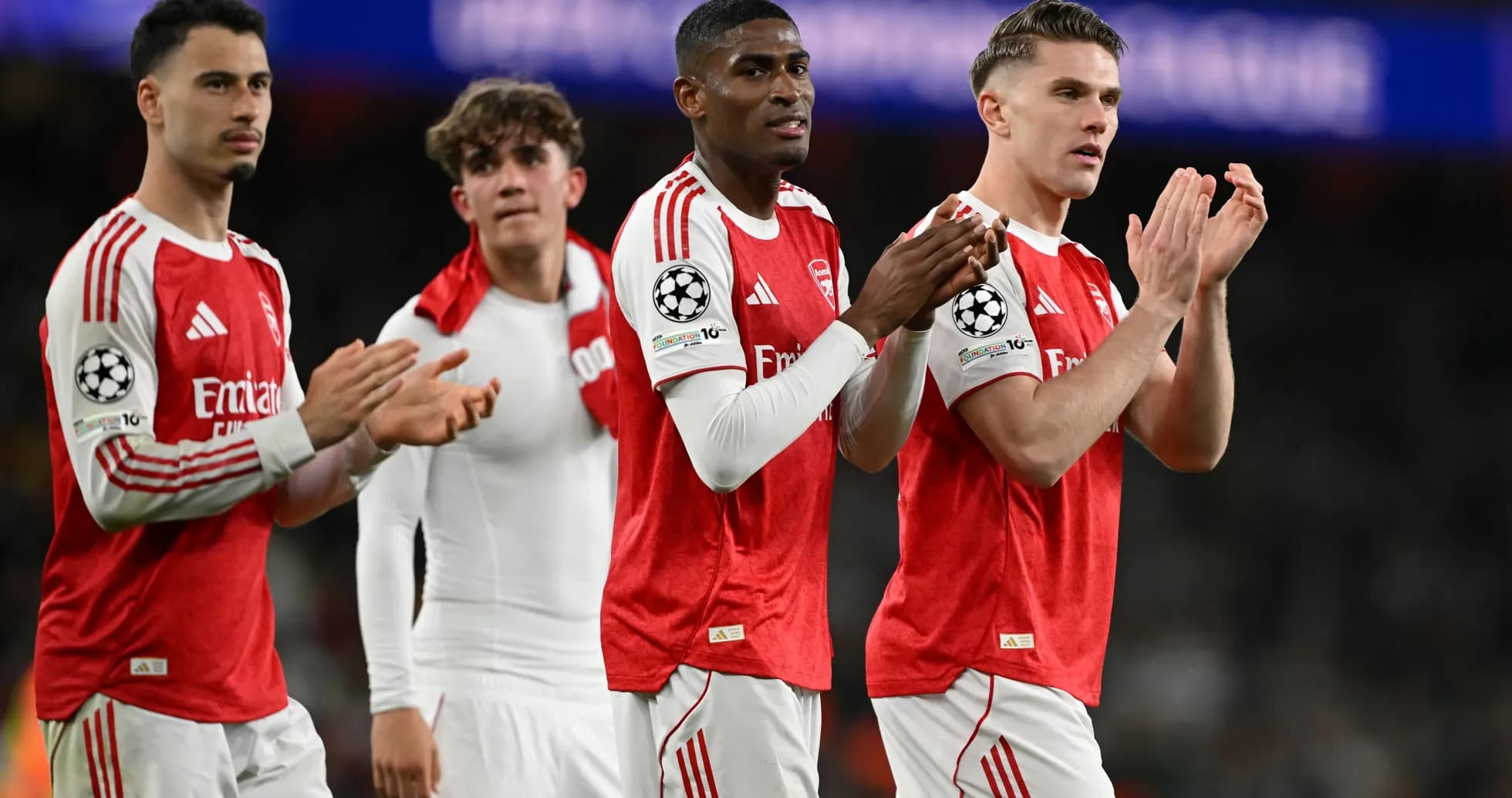 Arsenal players celebrating after Champions League match