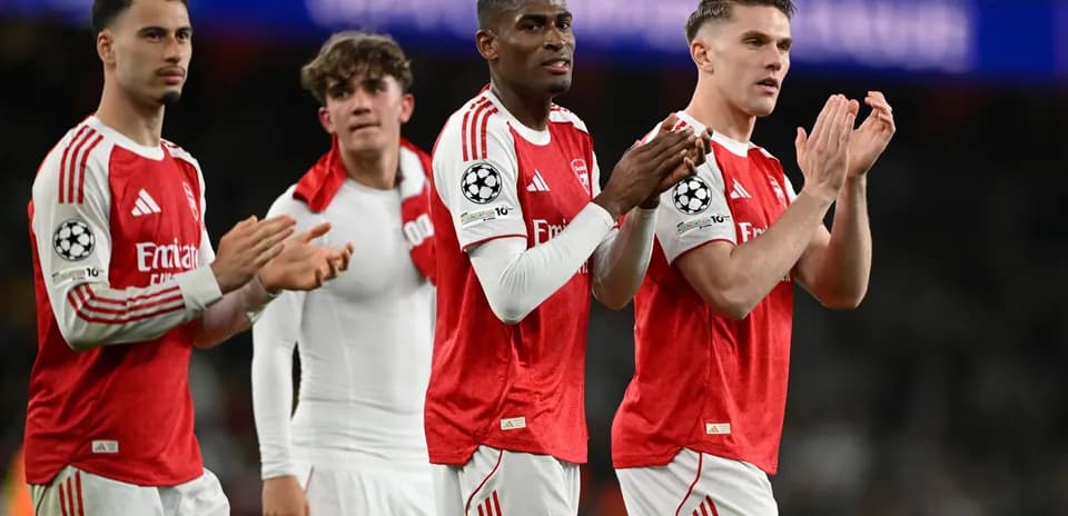 Arsenal players celebrating after Champions League match