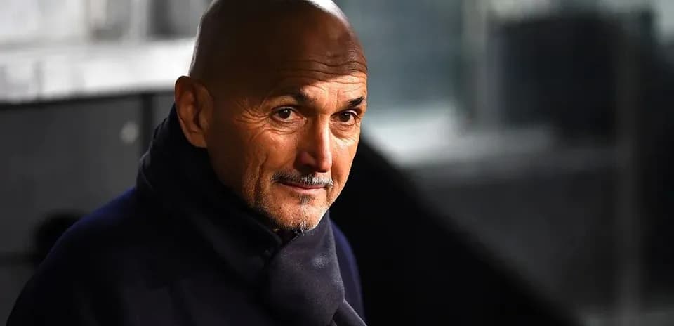 Coach observing from the sidelines during match