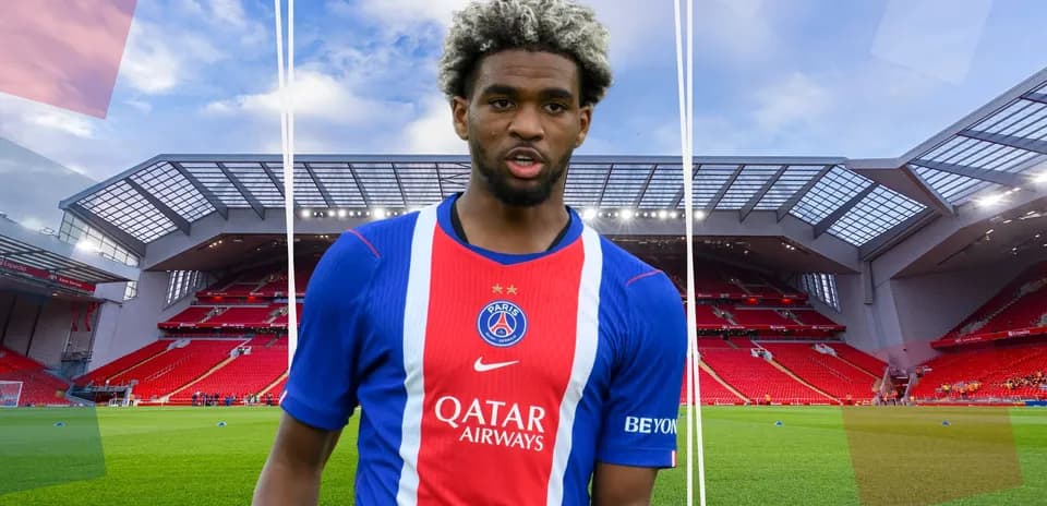 Player in PSG jersey at Anfield stadium