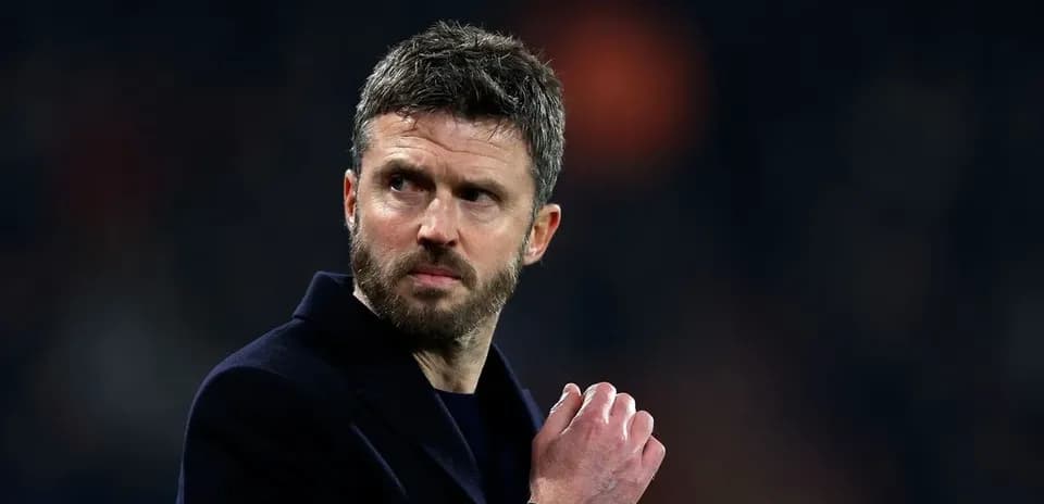Coach gesturing during a match on the sidelines