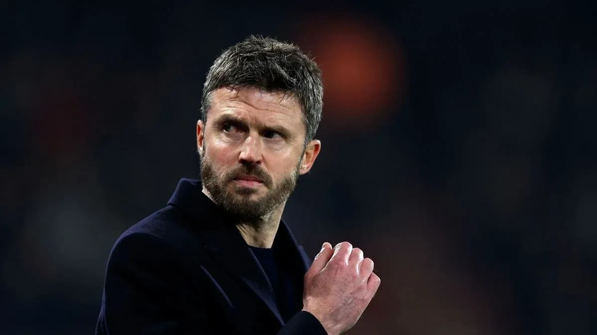 Coach gesturing during a match on the sidelines