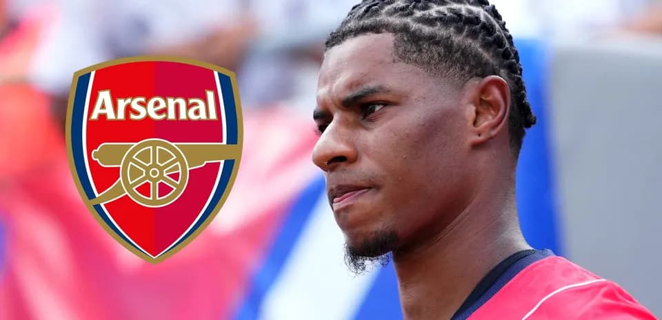 Player with braided hair next to Arsenal logo