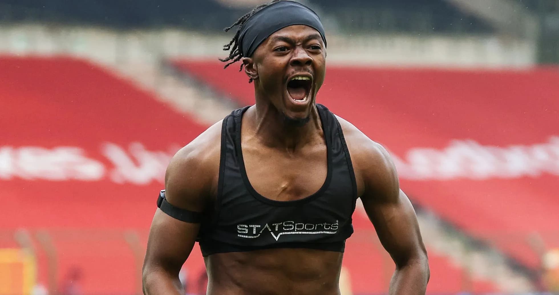 Athlete celebrating during training session on pitch