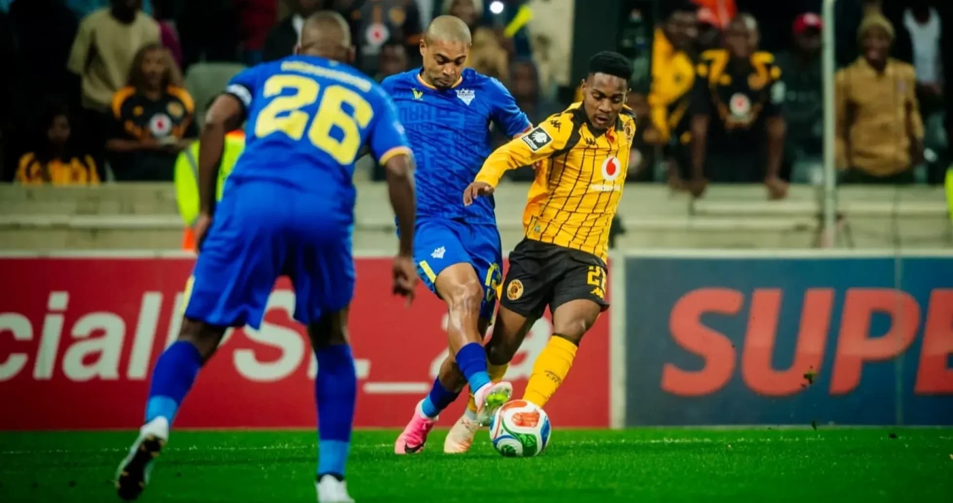Players competing for the ball during match