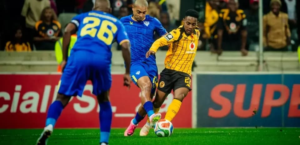 Players competing for the ball during match
