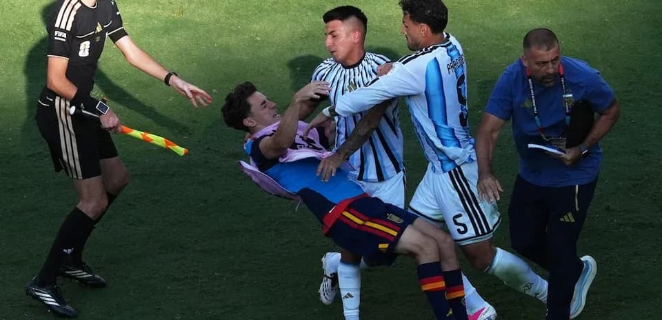 Spain and Argentina players clashing during match