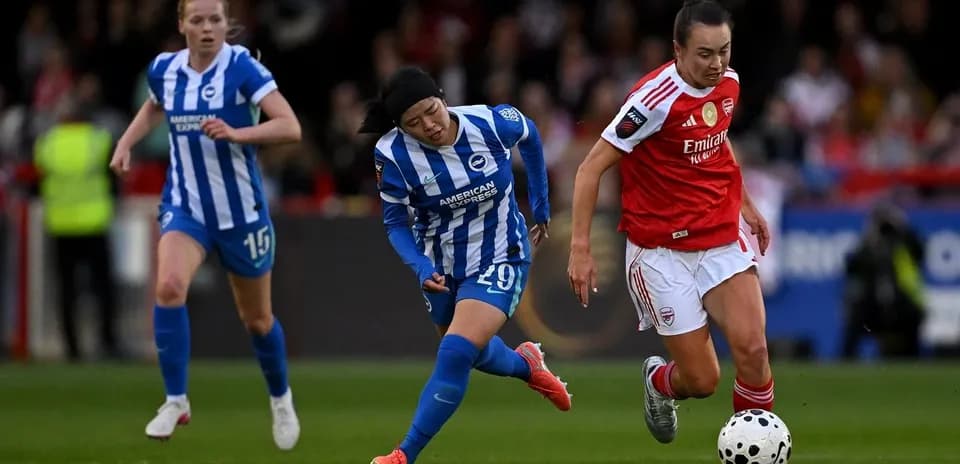 Players competing for the ball during match action