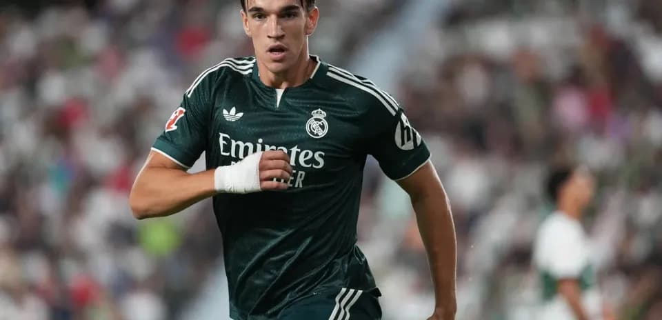 Real Madrid player running during a match