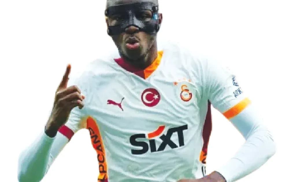 Player celebrating in Galatasaray jersey and mask